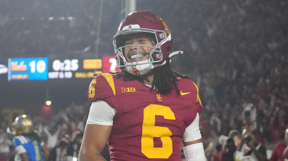  Nov 29, 2025; Los Angeles, California, USA; Southern California Trojans wide receiver Makai Lemon (6) celebrates after catching a 32-yard touchdown pass against the UCLA Bruins in the second half at United Airlines Field at Los Angeles Memorial Coliseum. Mandatory Credit: Kirby Lee-Imagn Images | Kirby Lee-Imagn Images 
