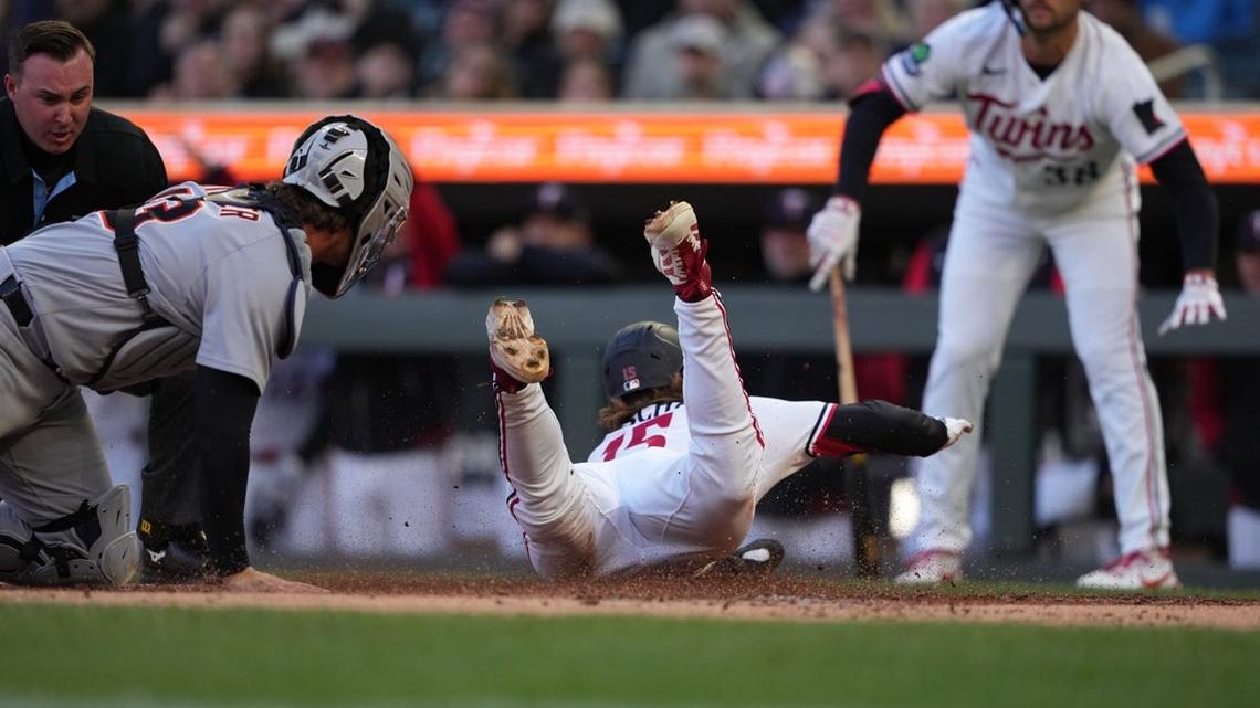 Twins post 6-run 1st, then hold off late Tigers rally 
