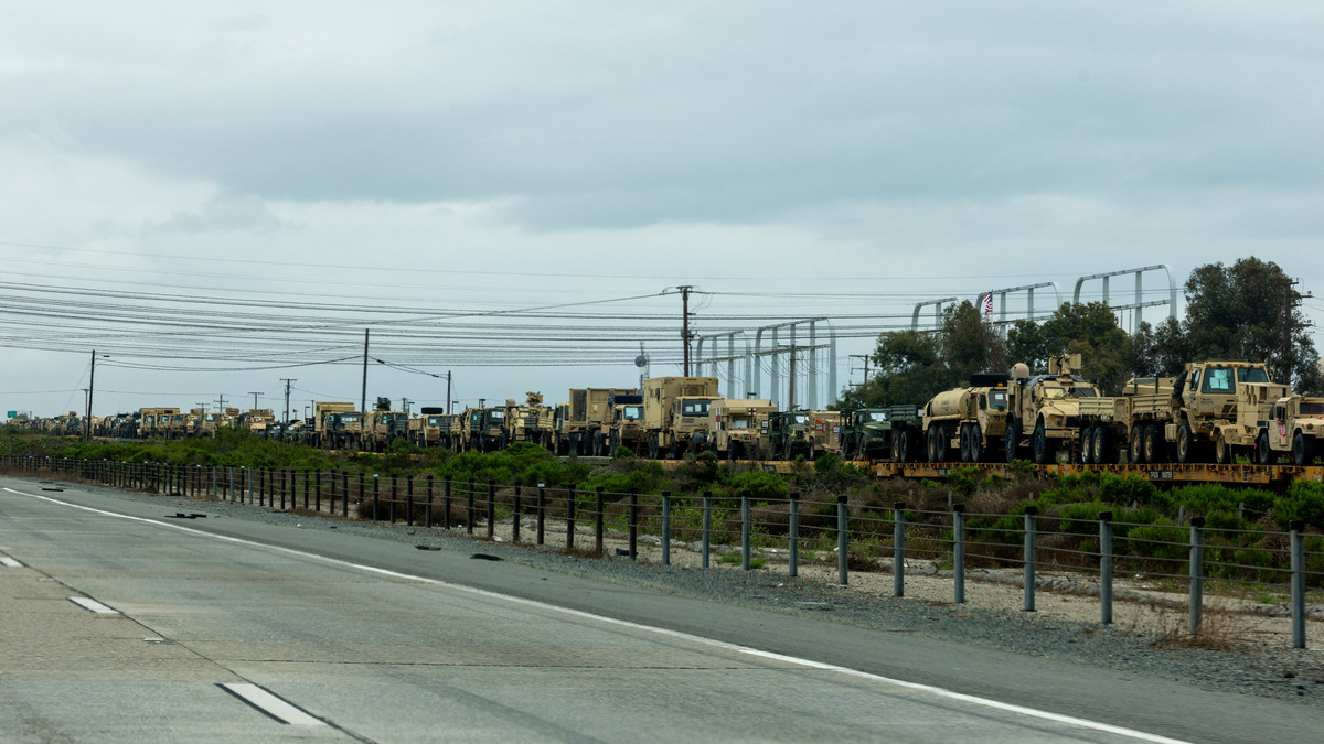 A train transporting U.S. military equipment travels through Camp Pendleton in California, U.S., March 31, 2026. REUTERS/Mike Blake