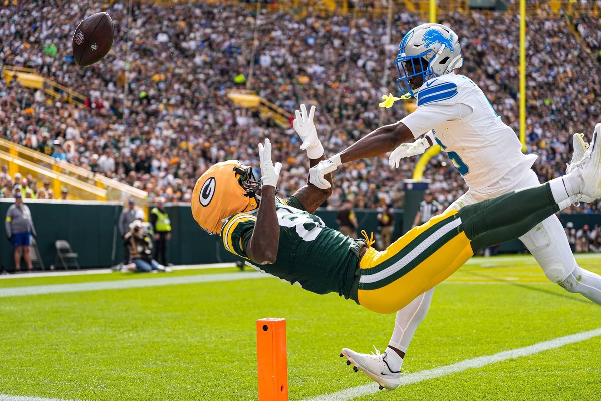  Lions cornerback Terrion Arnold breaks a pass intended for Packers wide receiver Romeo Doubs at Lambeau Field. 