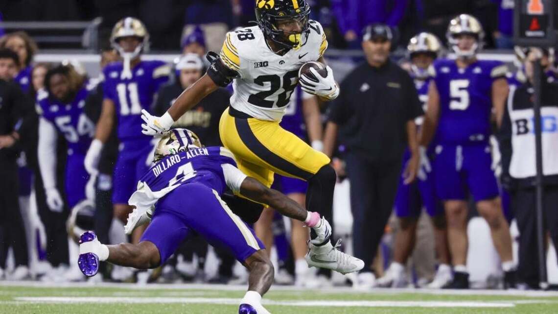 Kamari Moulton runs for 208 yards to lead No. 20 Iowa past Washington