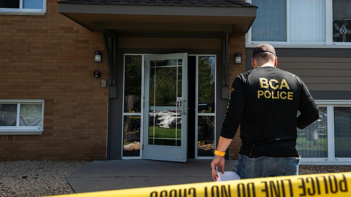 A Bureau of Criminal Apprehension official arrives to investigate the apartment of the Annunciation Church shooter in Richfield, Minnesota, on Wednesday, Aug. 27, 2025.