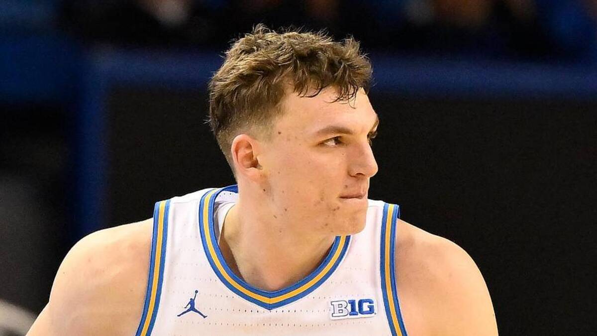  Feb 21, 2026; Los Angeles, California, USA; UCLA forward Tyler Bilodeau (34) runs back on defense after scoring a three-point basket during the second half against the Illinois Fighting Illini at Pauley Pavilion presented by Wescom Financial. Mandatory Credit: Robert Hanashiro-Imagn Images | Robert Hanashiro-Imagn Images 