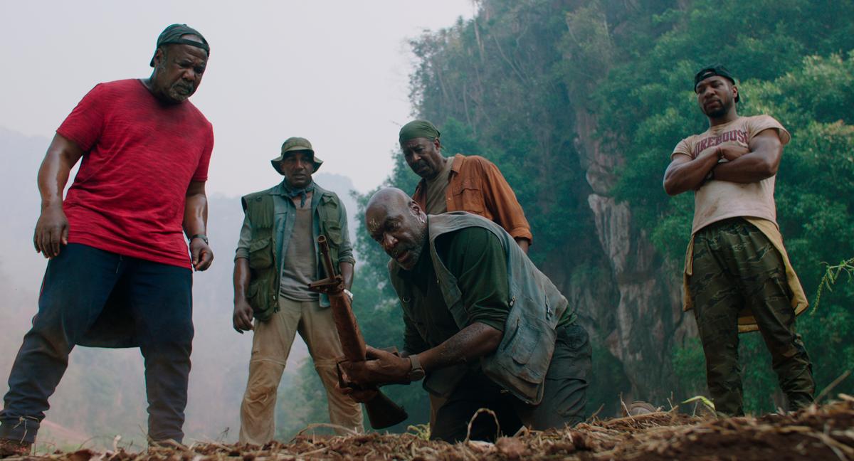 Isiah Whitlock, from left, Norm Lewis, Delroy Lindo, Clarke Peters and Jonathan Majors are Vietnam veterans in “Da 5 Bloods.” The Screen Actors Guild nominated the cast for best film ensemble. The movie was co-written by University of Kansas film professor Kevin Willmott.