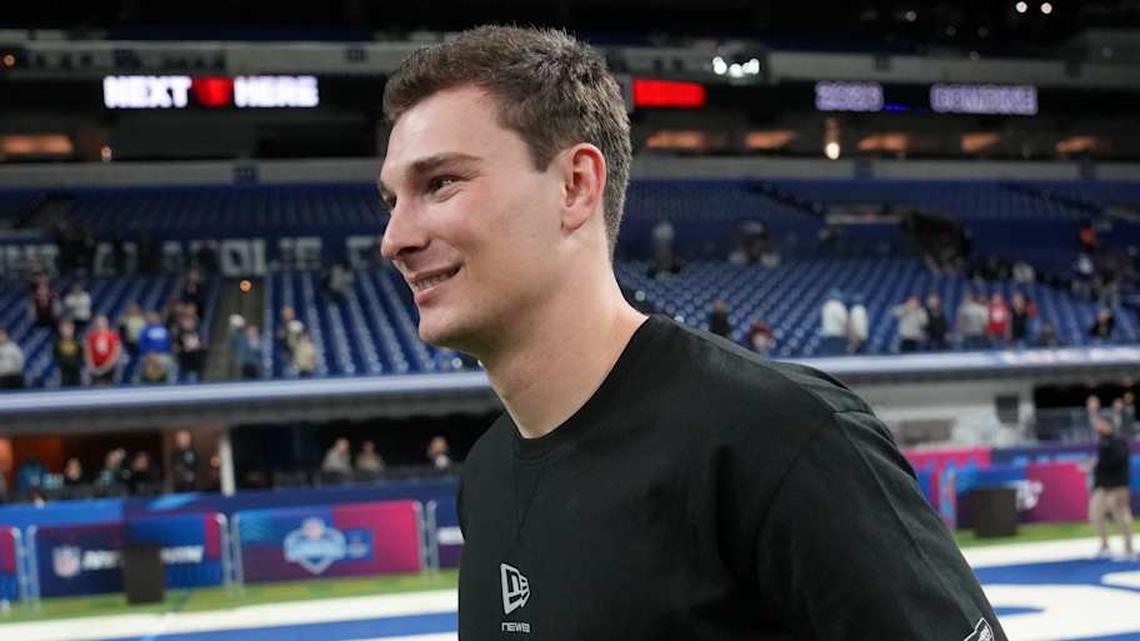  Feb 28, 2026; Indianapolis, IN, USA; Indiana quarterback Fernando Mendoza (QB11) looks on during the NFL Scouting Combine at Lucas Oil Stadium. Mandatory Credit: Kirby Lee-Imagn Images | Kirby Lee-Imagn Images 