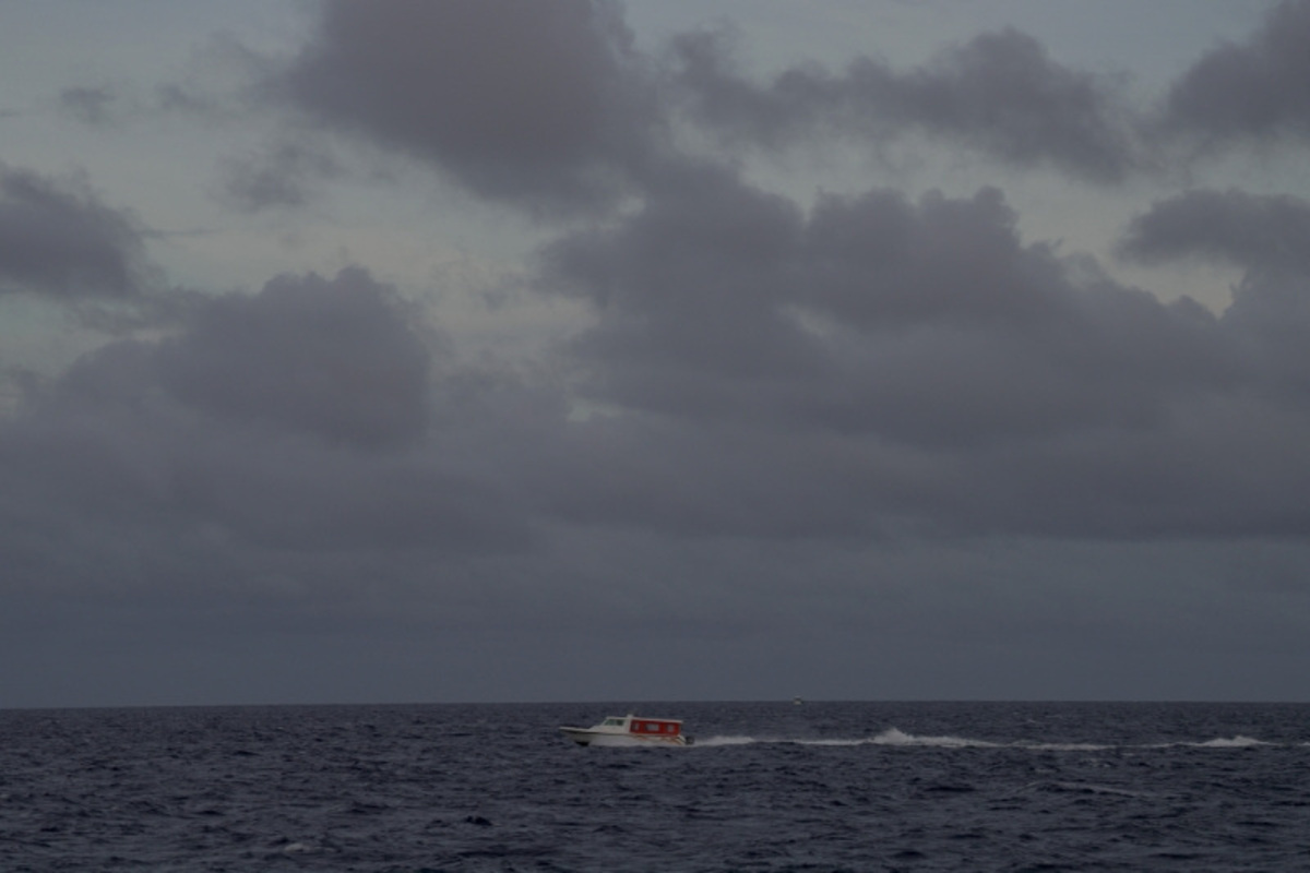 A speed boat moves in the waters of the Indian Ocean near Male, after a specialist team located the bodies of four missing Italian scuba divers who died in an accident in underwater caves, Maldives, May 18, 2026. REUTERS/Thilina Kaluthotage