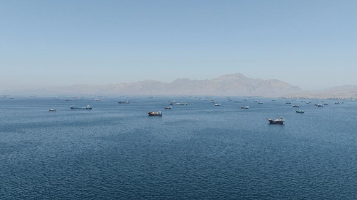 A drone view shows vessels sailing through the Strait of Hormuz, as seen from Musandam, Oman, May 25, 2026. REUTERS/Stringer