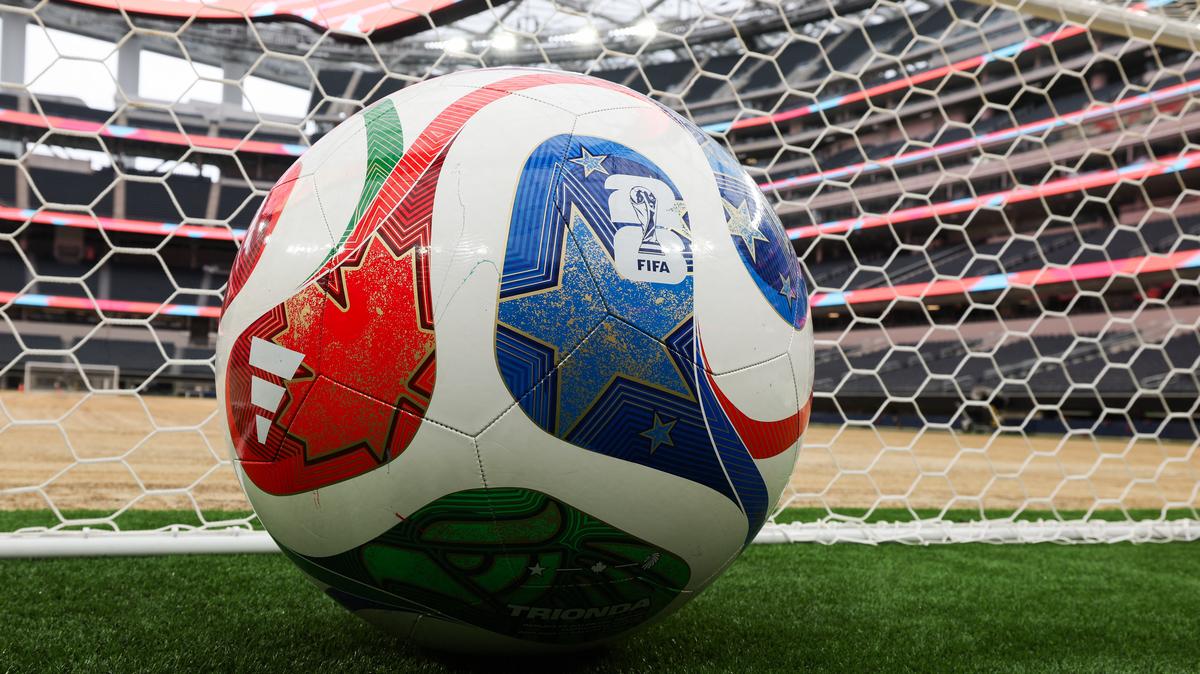 FBL-WC-2026-STADIUM-LOS ANGELES. A giant ball is displayed behind a goal as an expanded pitch surface area, which required the removal of corner seating and a raised custom field platform, awaits the installation of grass during the 30 Days to FIFA World Cup 2026 media event at SoFI Stadium before the pitch installation and temporary renaming to Los Angeles Stadium in Inglewood, California on May 12, 2026. The US Men's National Team will play their first 2026 FIFA World Cup match on June 12 against Paraguay.