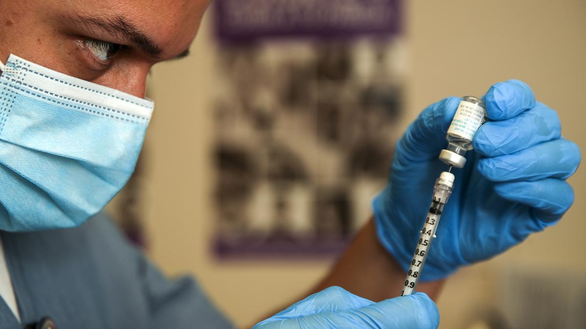 Registered nurse Luis Garcia prepares an mpox vaccine at St. John’s Well Child & Family Center in Los Angeles. (Irfan Khan/Los Angeles Times/TNS)
