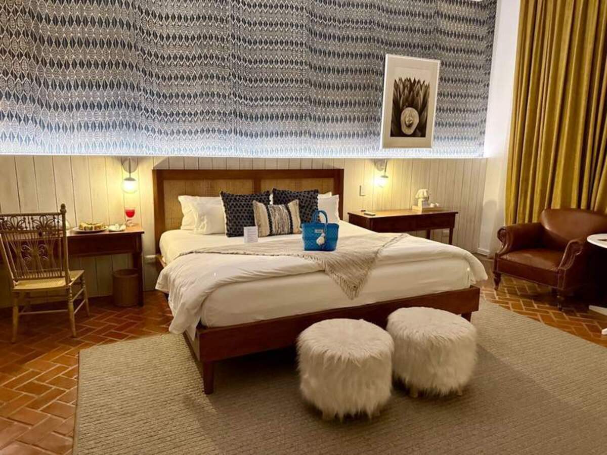  Designed without a television to encourage mindful relaxation, each guest room showcases unique, locally made artistry. Photo credit: Gentry Hale 