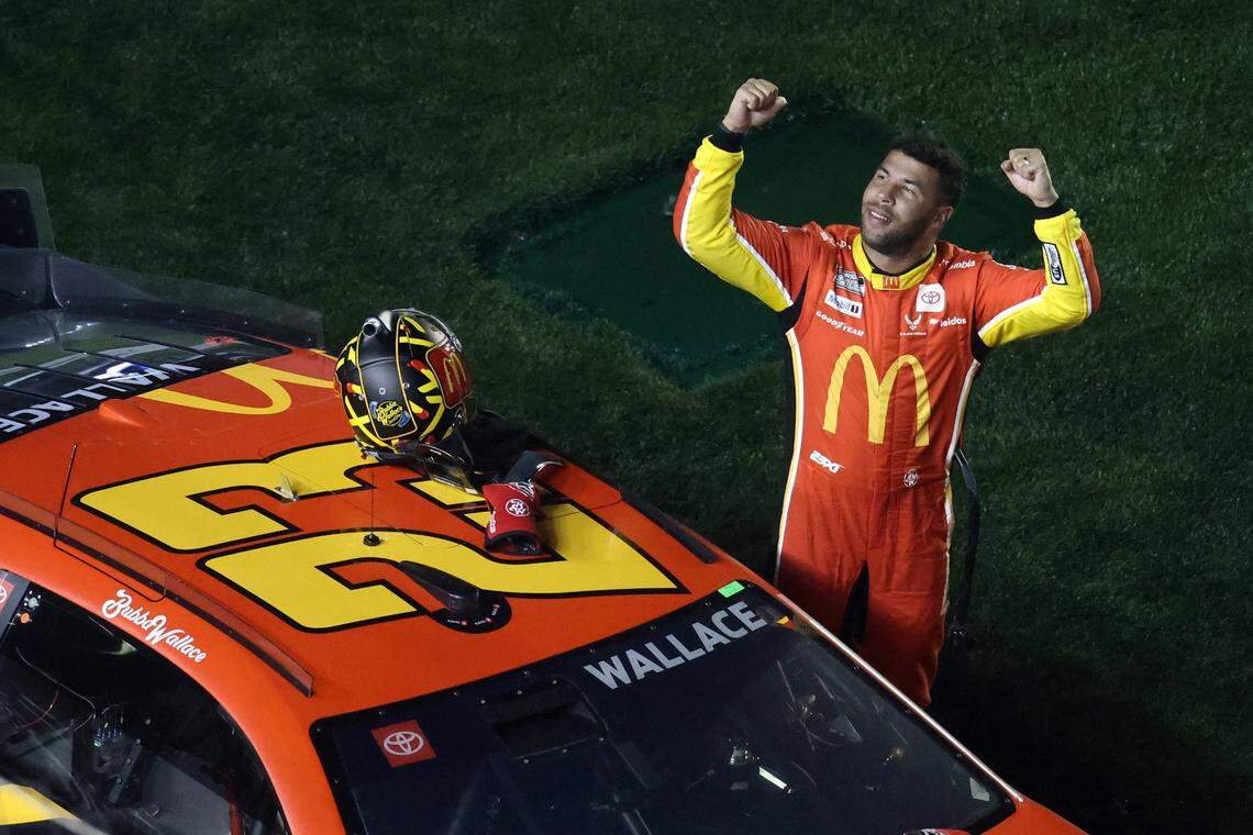 Feb 13, 2025; Daytona Beach, Florida, USA; NASCAR Cup Series driver Bubba Wallace (23) reacts after winning Duel 1 at Daytona International Speedway.