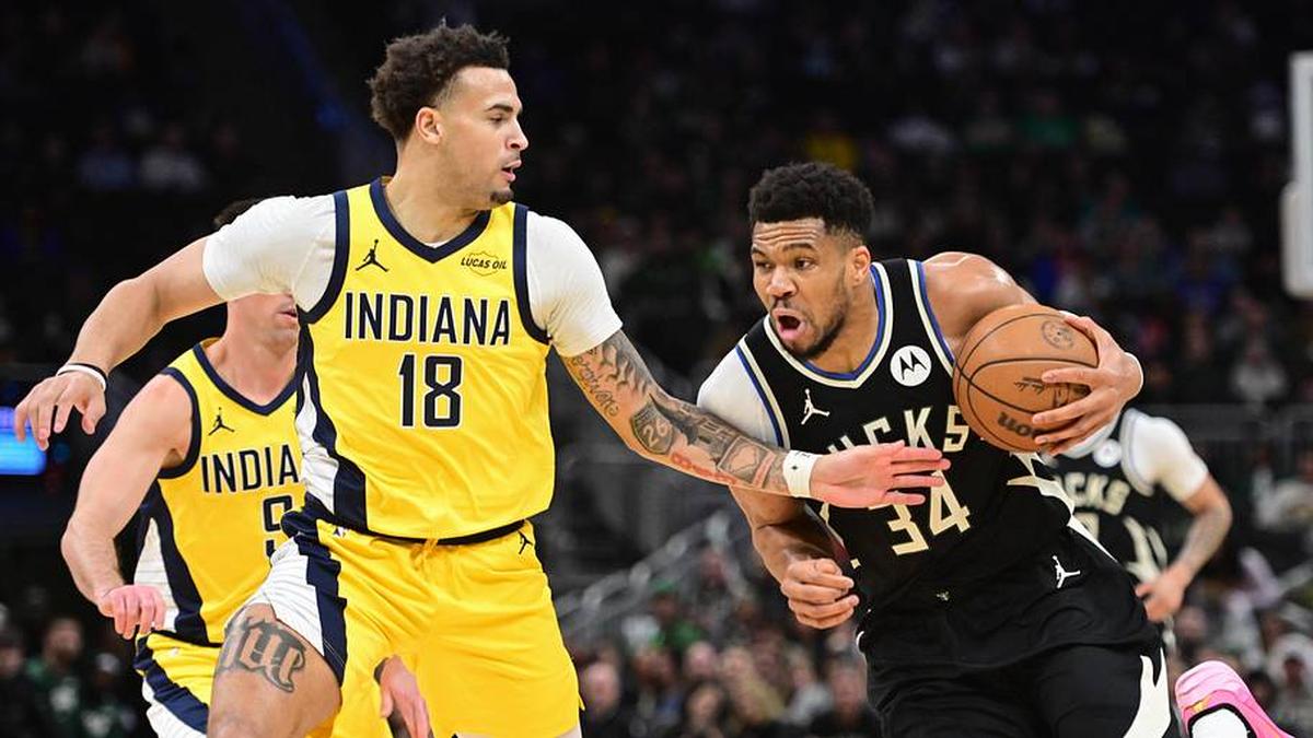  Mar 15, 2026; Milwaukee, Wisconsin, USA; Milwaukee Bucks forward Giannis Antetokounmpo (34) drives for the basket against Indiana Pacers forward Jalen Slawson (18) in the first quarter at Fiserv Forum. Mandatory Credit: Benny Sieu-Imagn Images | Benny Sieu-Imagn Images 
