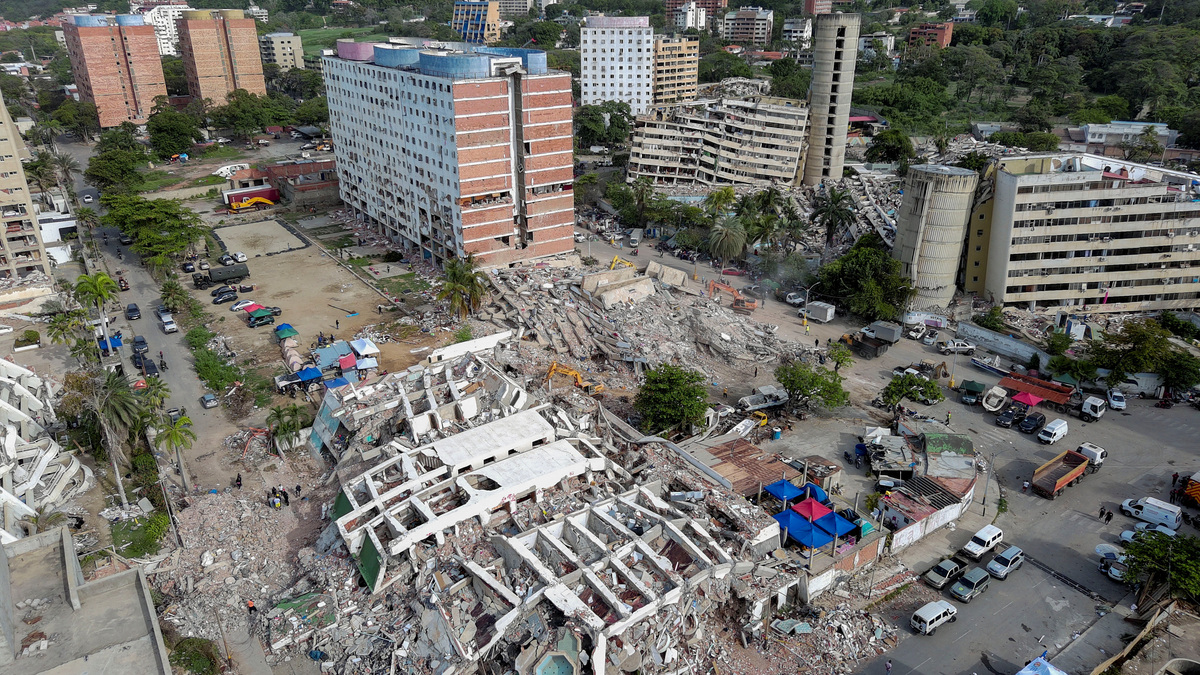 A drone view shows the remains of the apartment building where Maria Alejandra Sanz was trapped after twin earthquakes struck La Guaira, Venezuela, July 4, 2026. 
