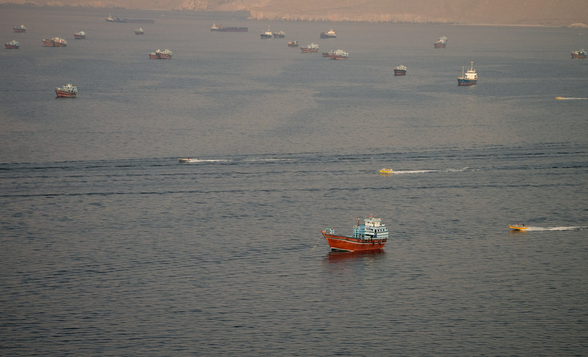 Vessels at the Strait of Hormuz, as seen from Musandam, Oman, June 14, 2026. REUTERS/Stringer