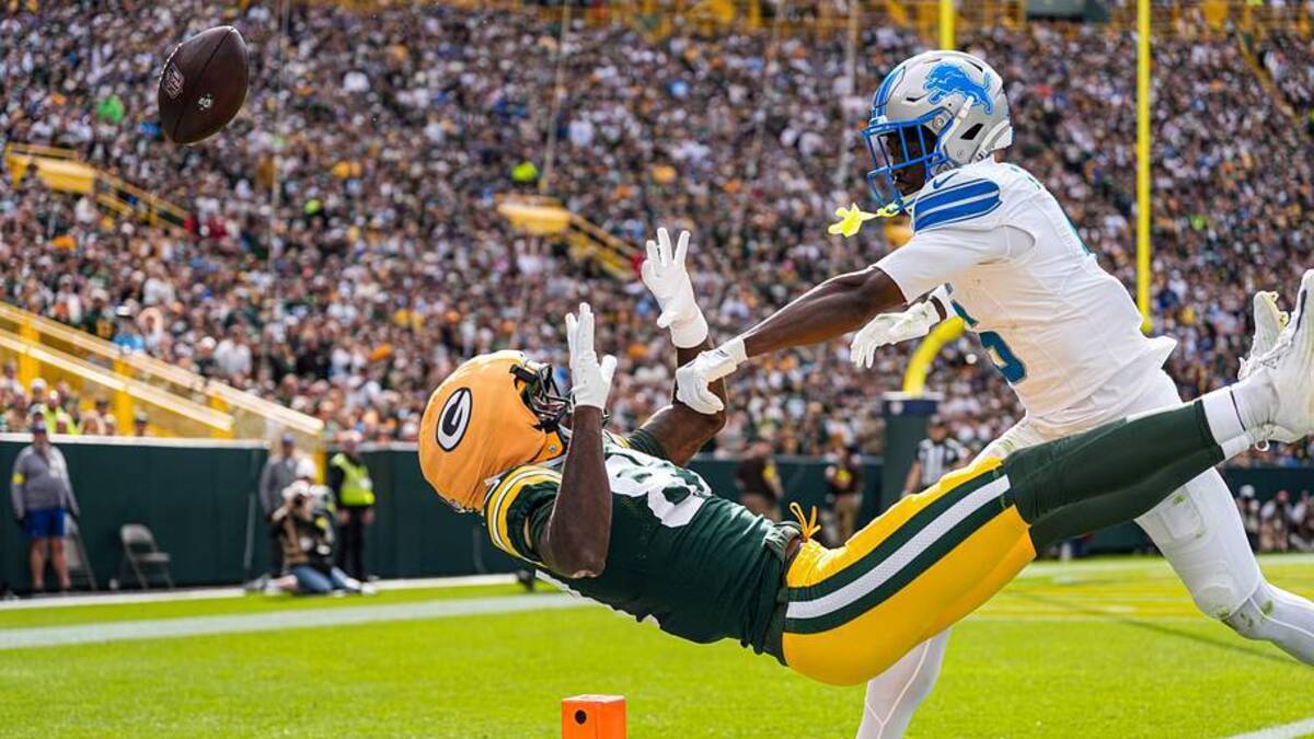  Detroit Lions cornerback Terrion Arnold breaks a pass intended for Green Bay Packers wide receiver Romeo Doubs during the first half at Lambeau Field in Green Bay, Wis., on Sunday, Sept. 7, 2025. | Junfu Han / USA TODAY NETWORK via Imagn Images 