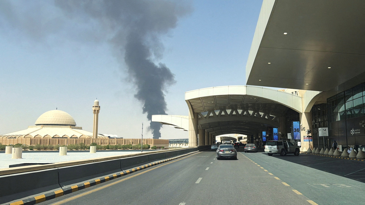 Large plume of black smoke rises from the fuel storage depot at King Khalid International Airport, in Riyadh, Saudi Arabia