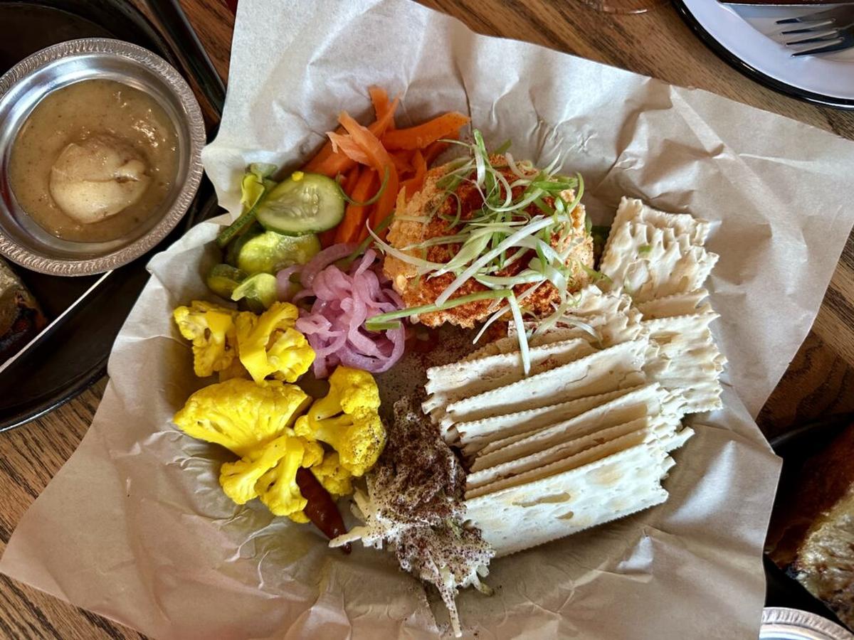  Pickled veggies add interest to Feather Bone’s pimento cheese board. Photo credit: Cathy Bennett Kopf 