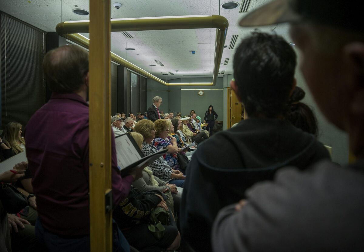  People packed a local meeting room in Evanston, Wyo., for a public hearing on a proposed data center. Natalie Behring/Getty Images 