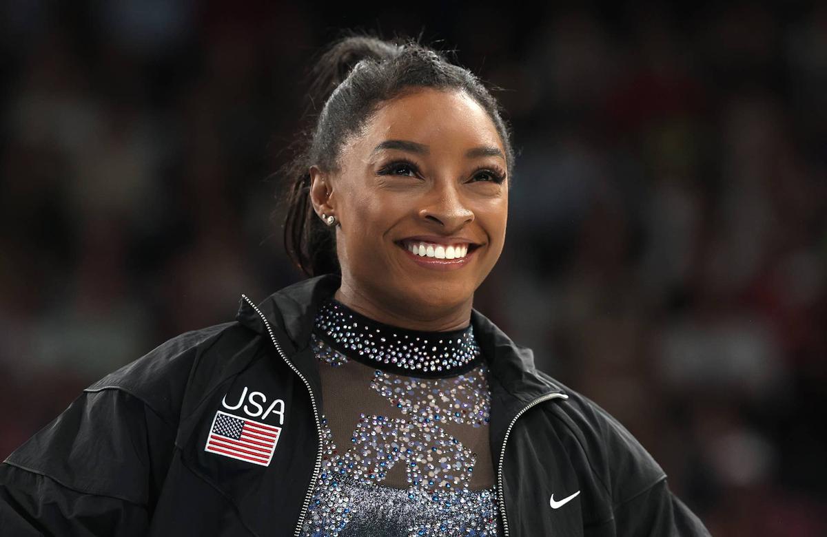  PARIS, FRANCE - JULY 28: Simone Biles of Team United States looks on as she arrives for the Artistic Gymnastics Women's Qualification on day two of the Olympic Games Paris 2024 at Bercy Arena on July 28, 2024 in Paris, France. (Photo by Jamie Squire/Getty Images) 