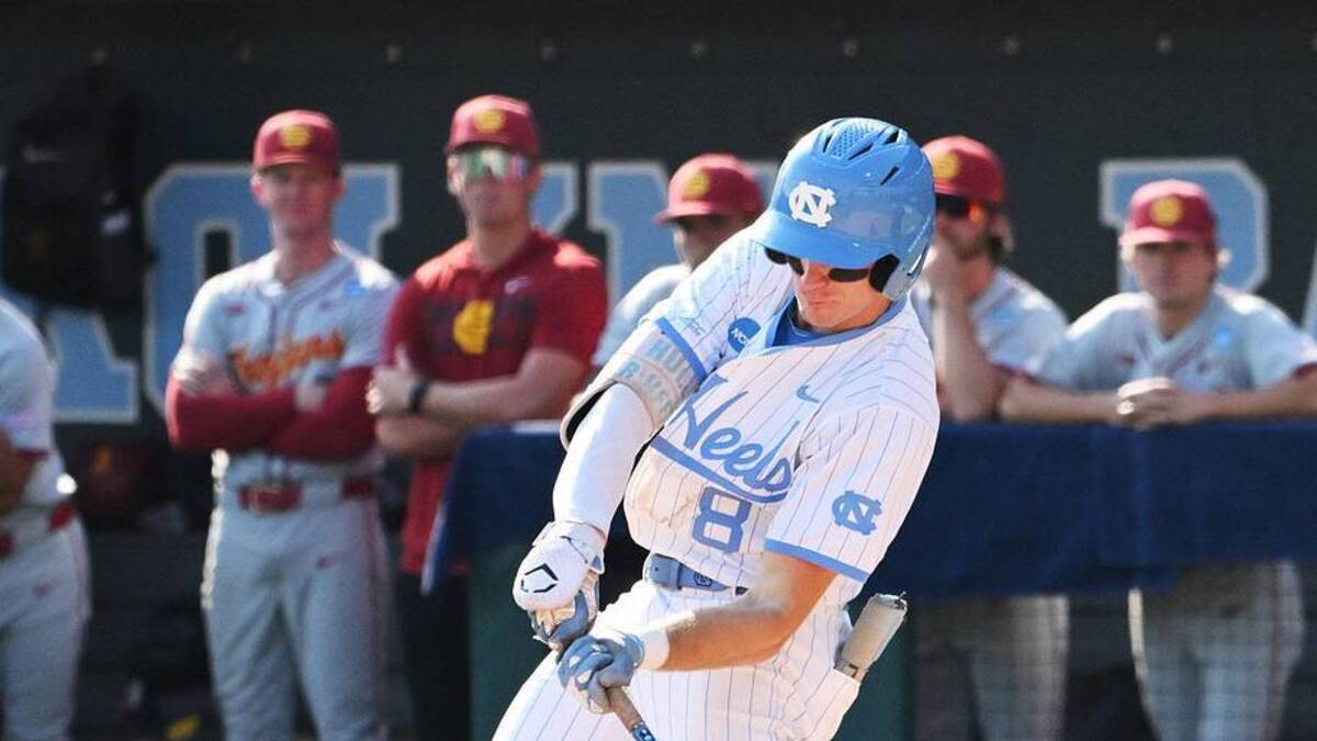  June 7, 2026; Chapel Hill, NC, USA; North Carolina Tar Heels outfielder Owen Hull (8) bats the game winning hit against the USC Trojans in the ninth inning at Boshamer Stadium. Mandatory Credit: Zachary Taft-Imagn Images | Zachary Taft-Imagn Images 