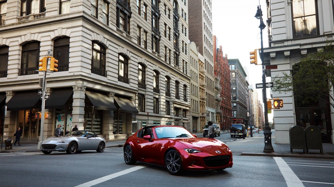 2026 Mazda MX-5 Miata vs. 2026 Ford Mustang EcoBoost: We'd Spend Our Own Money on This One 