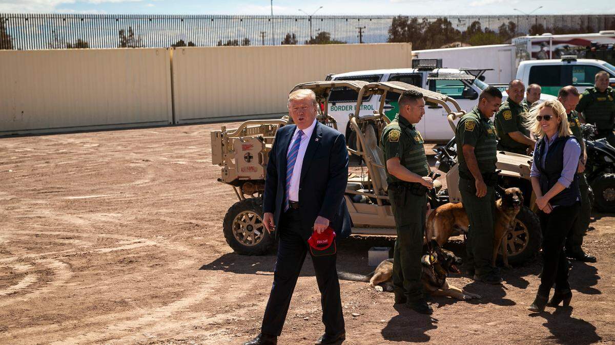 Then-President Donald Trump tours El Centro Sector during a visit to the new border wall in Calexico, Calif., in 2019. Nearly eight years after the first challenges to his immigration policies, President-elect Trump is returning to the White House promising a more aggressive crackdown.