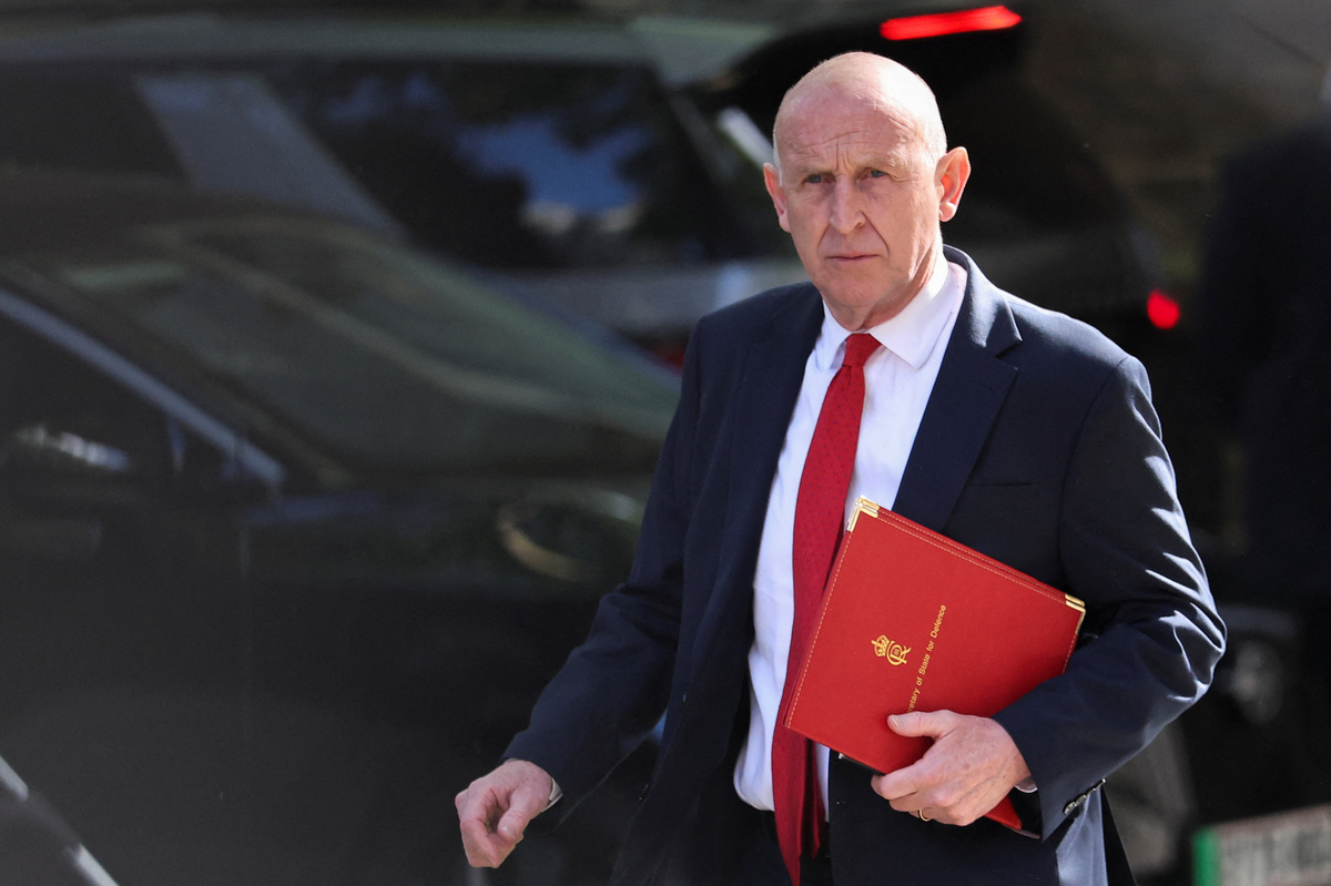 British Defence Secretary John Healey walks on Downing Street, to attend a cabinet meeting, the day before the State Opening of Parliament, in London, Britain, May 12, 2026. REUTERS/Toby Melville