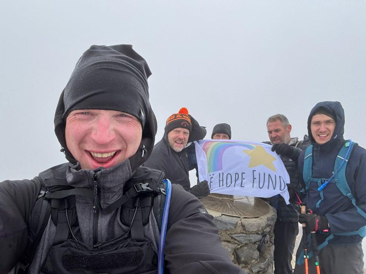  Nathan and his friends during the Three Peaks challenge. (Nathan Norris via SWNS) 
