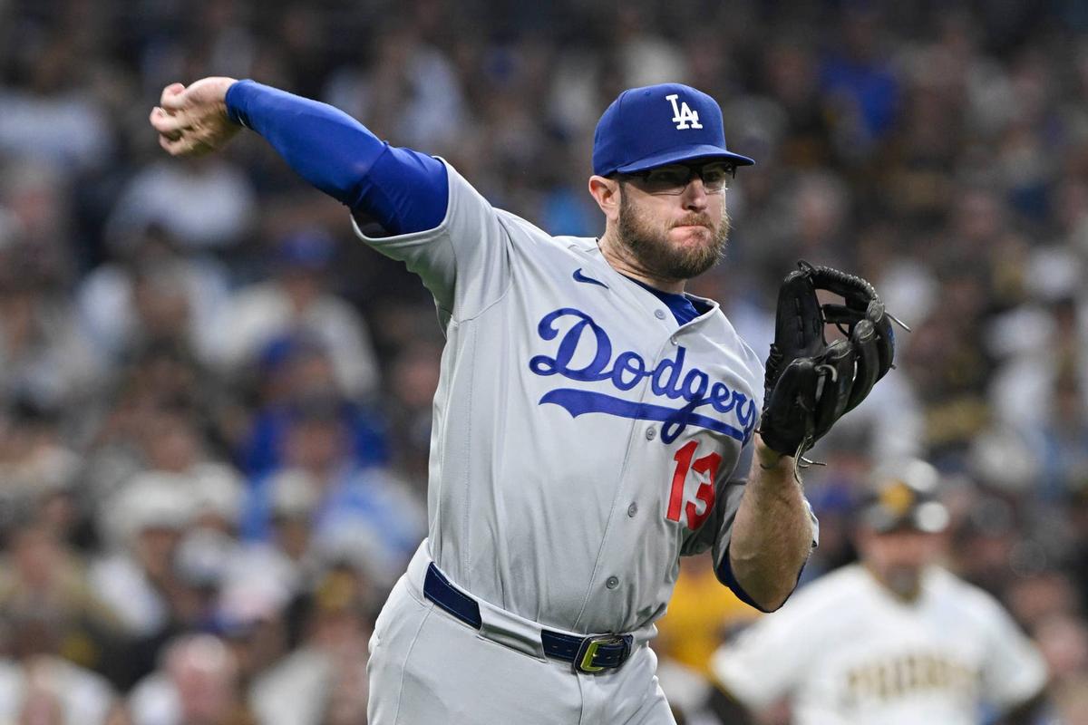  Los Angeles Dodgers third baseman Max Muncy (13) against the San Diego Padres. © Denis Poroy-Imagn Images