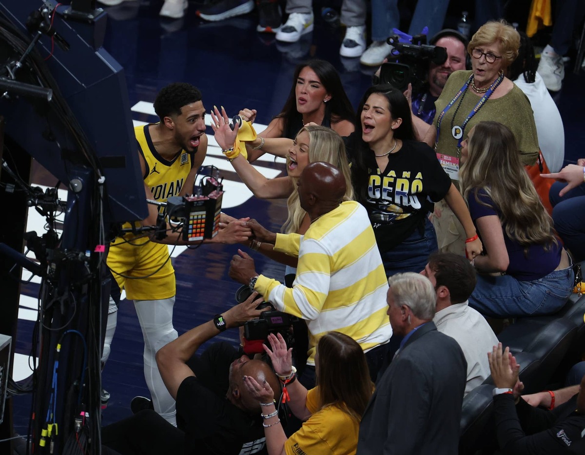  Jun 13, 2025; Indianapolis, Indiana, USA; Indiana Pacers guard Tyrese Haliburton (0) reacts with his girlfriend Jade Jones and father John Haliburton following the second quarter against the Oklahoma City Thunder in game four of the 2025 NBA Finals at Gainbridge Fieldhouse. Mandatory Credit: Trevor Ruszkowski-Imagn Images 