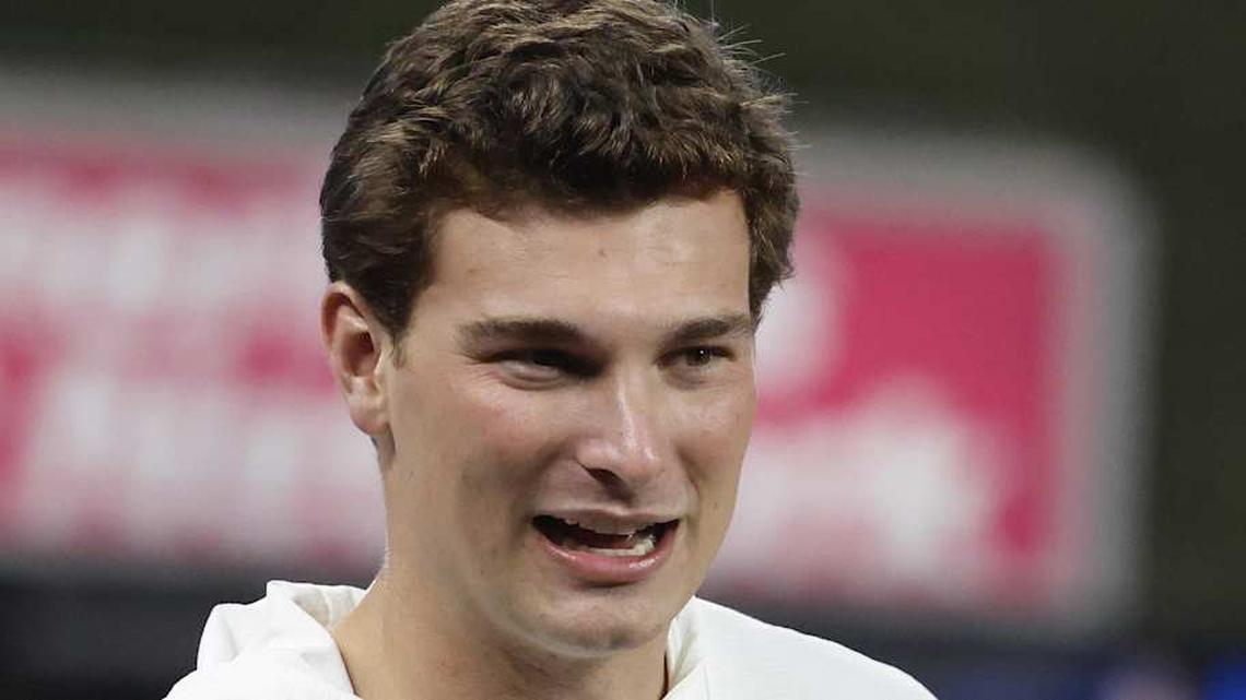  Apr 21, 2026; Miami, Florida, USA; Indiana Hoosiers quarterback Fernando Mendoza prepares to throw the ceremonial first pitch before a game between the Miami Marlins and the St. Louis Cardinals at loanDepot Park. Mandatory Credit: Rhona Wise-Imagn Images | Rhona Wise-Imagn Images 