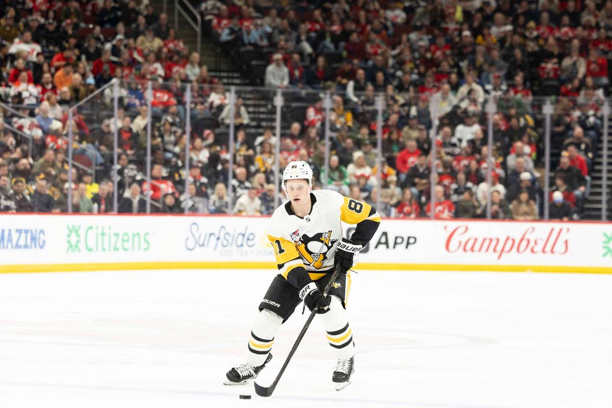  Apr 9, 2026; Newark, New Jersey, USA; Pittsburgh Penguins center Ben Kindel (81) skates with the puck against the New Jersey Devils during the first period at Prudential Center. Mandatory Credit: Luther Schlaifer-Imagn Images