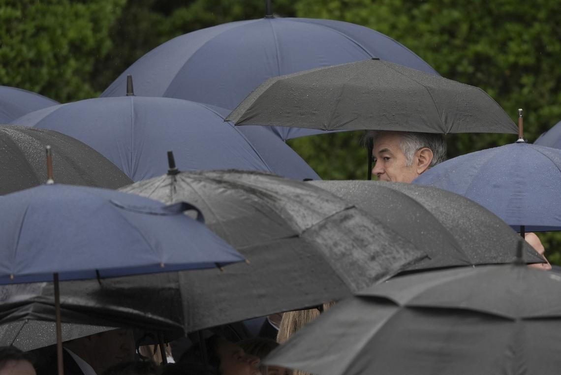 Dr. Mehmet Oz, administrator of the Centers for Medicare & Medicaid Services, amid umbrellas before an arrival ceremony for King Charles III and Queen Camilla on the South Lawn of the White House in Washington, on Tuesday, April 28, 2026. (Salwan Georges/The New York Times)