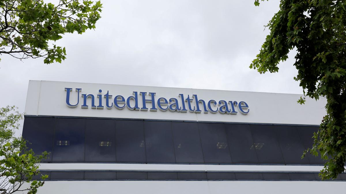 The corporate logo of UnitedHealthcare, the insurance unit of UnitedHealth Group, appears on the side of one of their office buildings in Santa Ana, California, U.S., April 13, 2020. REUTERS/Mike Blake