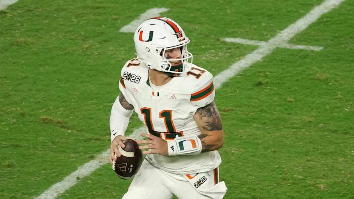  Jan 19, 2026; Miami Gardens, FL, USA; Miami Hurricanes quarterback Carson Beck (11) scrambles with the ball against the Indiana Hoosiers in the third quarter during the College Football Playoff National Championship game at Hard Rock Stadium. Mandatory Credit: Kim Klement Neitzel-Imagn Images | Kim Klement Neitzel-Imagn Images 