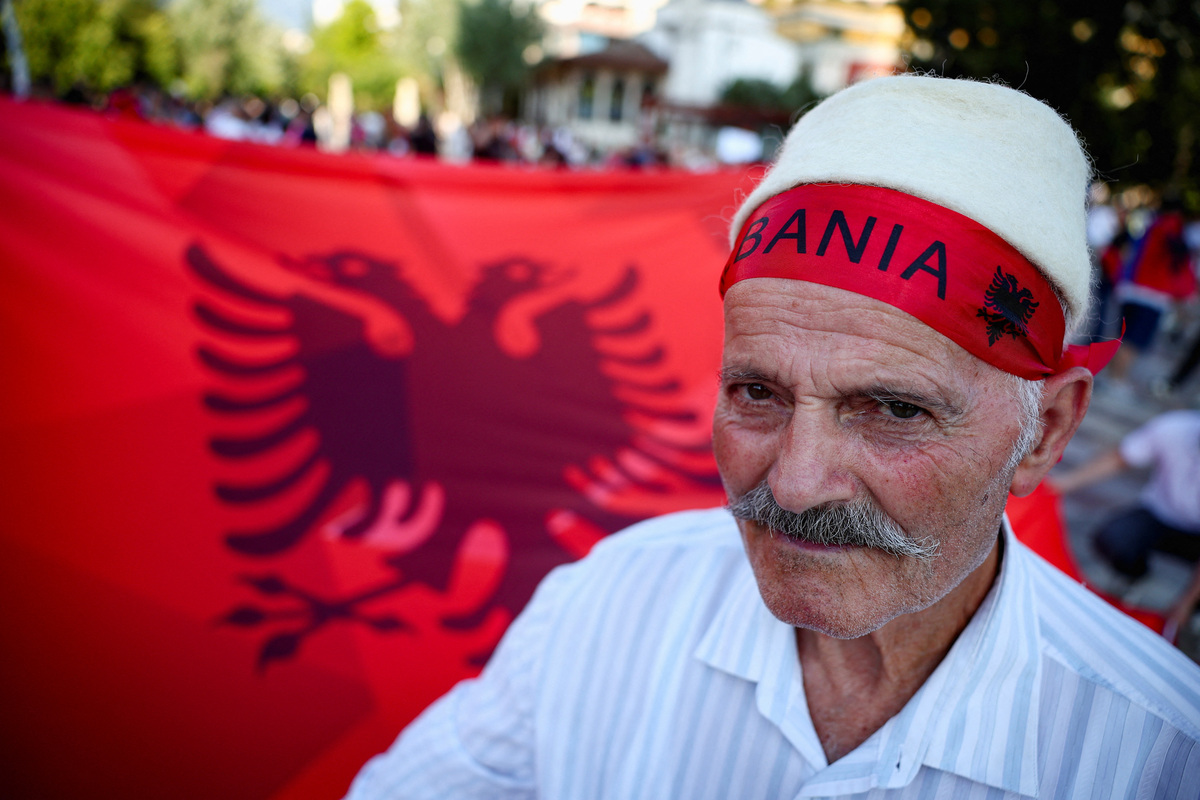 A demonstrator looks on during protest against a luxury resort, a plan by a company linked to U.S. President Donald Trump's son-in-law, Jared Kushner, on an environmentally sensitive part of the Adriatic coast, in Tirana, Albania, June 9, 2026. REUTERS/Florion Goga