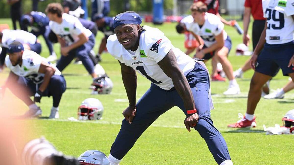  Jun 2, 2026; Foxborough, MA, USA; New England Patriots wide receiver A.J. Brown (1) warms up during the team's OTA at Gillette Stadium. Mandatory Credit: Eric Canha-Imagn Images | Eric Canha-Imagn Images 