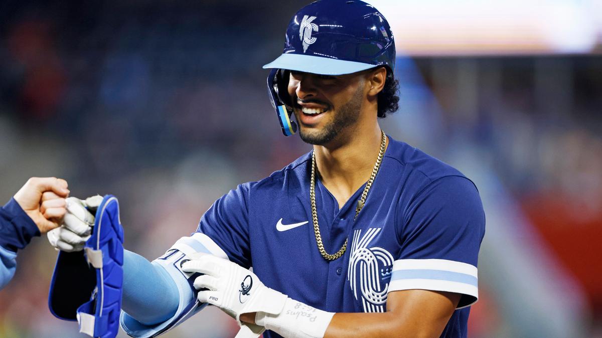 Kansas City Royals’ MJ Melendez smiles at first after his first hit in the majors, during the fifth inning of the team’s baseball game against St. Louis Cardinals in Kansas City, Mo., Tuesday, May 3, 2022. (AP Photo/Colin E. Braley)