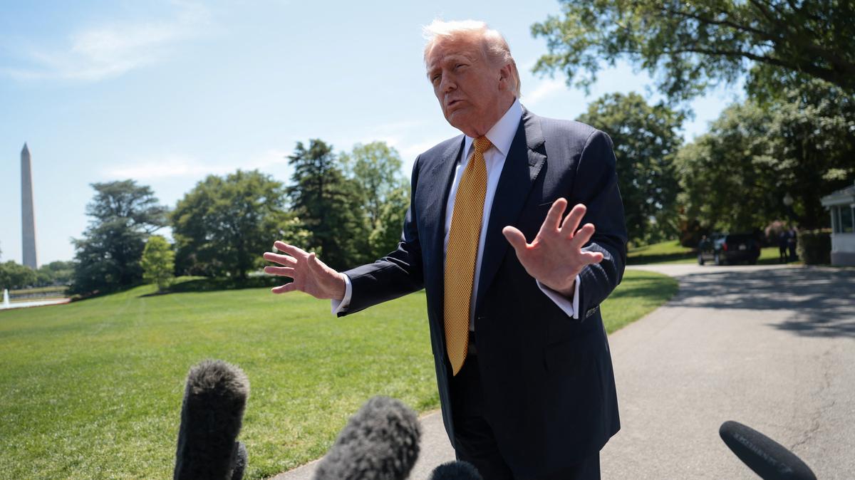 U.S. President Donald Trump speaks to the press, ahead of departing the White House for Joint Base Andrews en route to Beijing, China, in Washington, D.C., U.S., May 12, 2026. REUTERS/Evelyn Hockstein