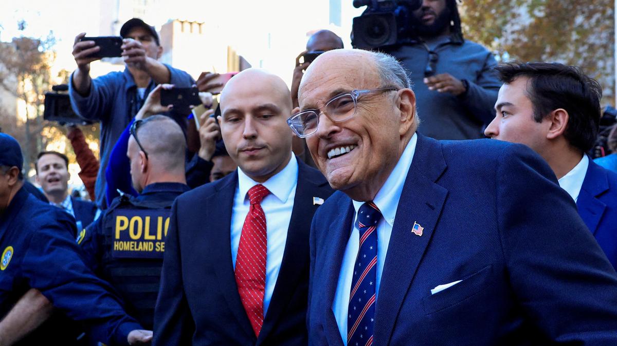 FILE PHOTO: Former Donald Trump lawyer and former New York City Mayor Rudolph Giuliani leaves U.S. Federal court after failing to surrender valuables to Georgia election workers he was found to have defamed, in Manhattan in New York City, U.S., November 7, 2024. REUTERS/Kena Betancur/File Photo