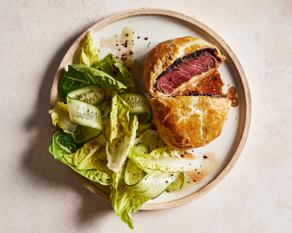 Grilled steak with tomatoes, basil and cheddar. Food Stylist: Rebecca Jurkevich. (Johnny Miller/The New York Times)