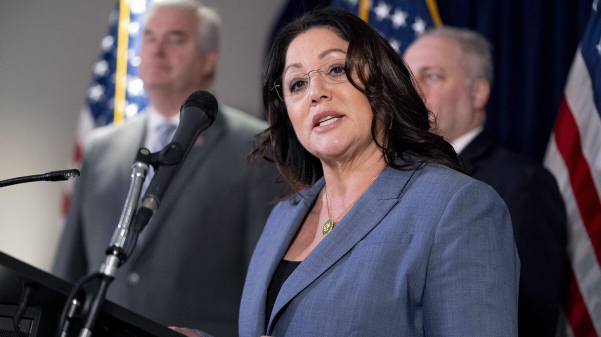 Rep. Lori Chavez-DeRemer, R-Ore., accompanied by Majority Whip Rep. Tom Emmer, R-Minn., left, and House Majority Leader Rep. Steve Scalise, R-La., right, speaks at a news conference on Capitol Hill in Washington, Jan. 25, 2023.