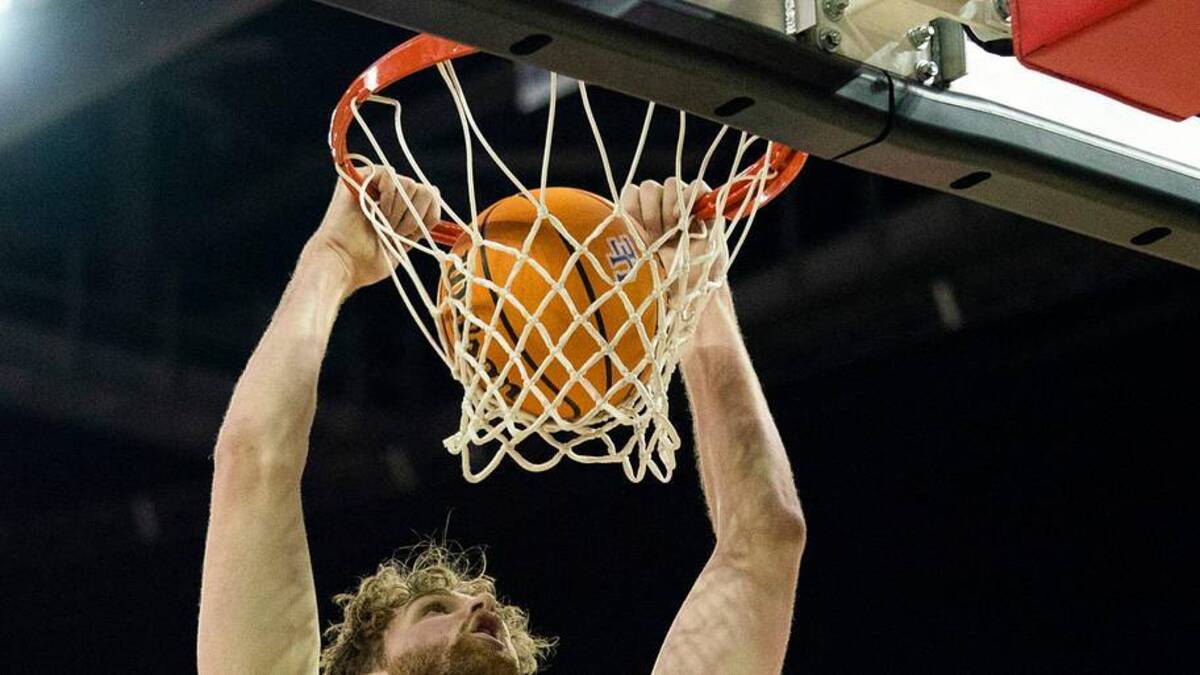 Evansville's Joshua Hughes (11) dunks as the Evansville Purple Aces play the Indiana State Sycamores at Ford Center in Evansville, Ind., Saturday, Jan. 4, 2025. | MaCabe Brown / Courier & Press / USA TODAY NETWORK via Imagn Images 