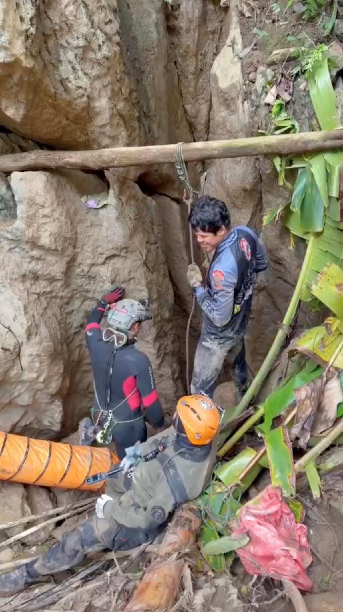 Members of a rescue team work to save people trapped in a cave, in Xaisomboun Province, Laos, May 25, 2026, in this screengrab taken from a handout video. Metta Tham Kalasin Rescue/Handout via REUTERS