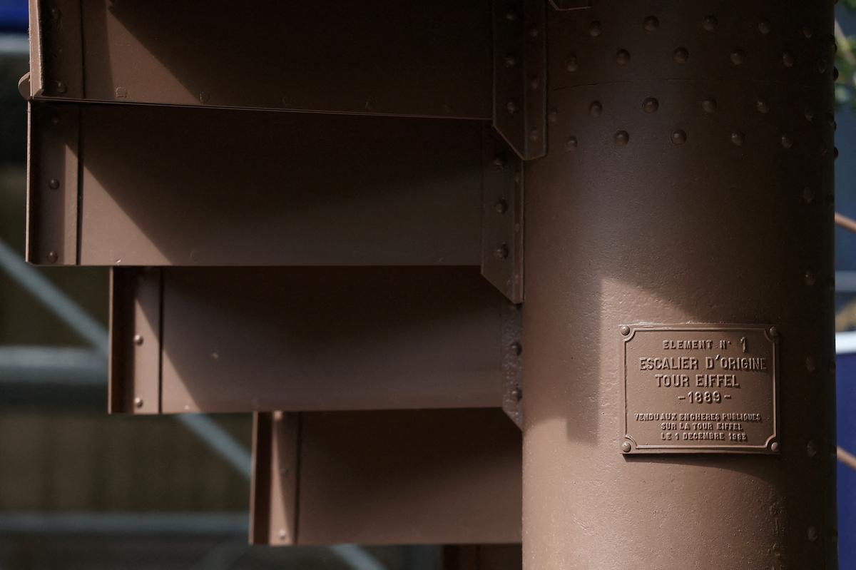 FILE PHOTO: A portion of the original staircase of the Eiffel Tower built by Gustave Eiffel in 1889 is displayed during a press preview ahead of its upcoming auction organized by Artcurial in Paris, France, May 13, 2026. REUTERS/Alice Sacco/File Photo