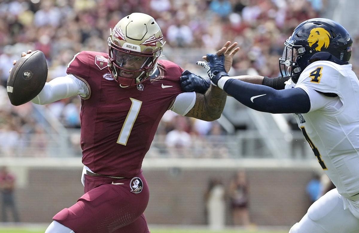Sep 6, 2025; Tallahassee, Florida, USA; Florida State Seminoles quarterback Tommy Castellanos (1) runs the ball during the first half against the East Texas A&M Lions at Doak S. Campbell Stadium.