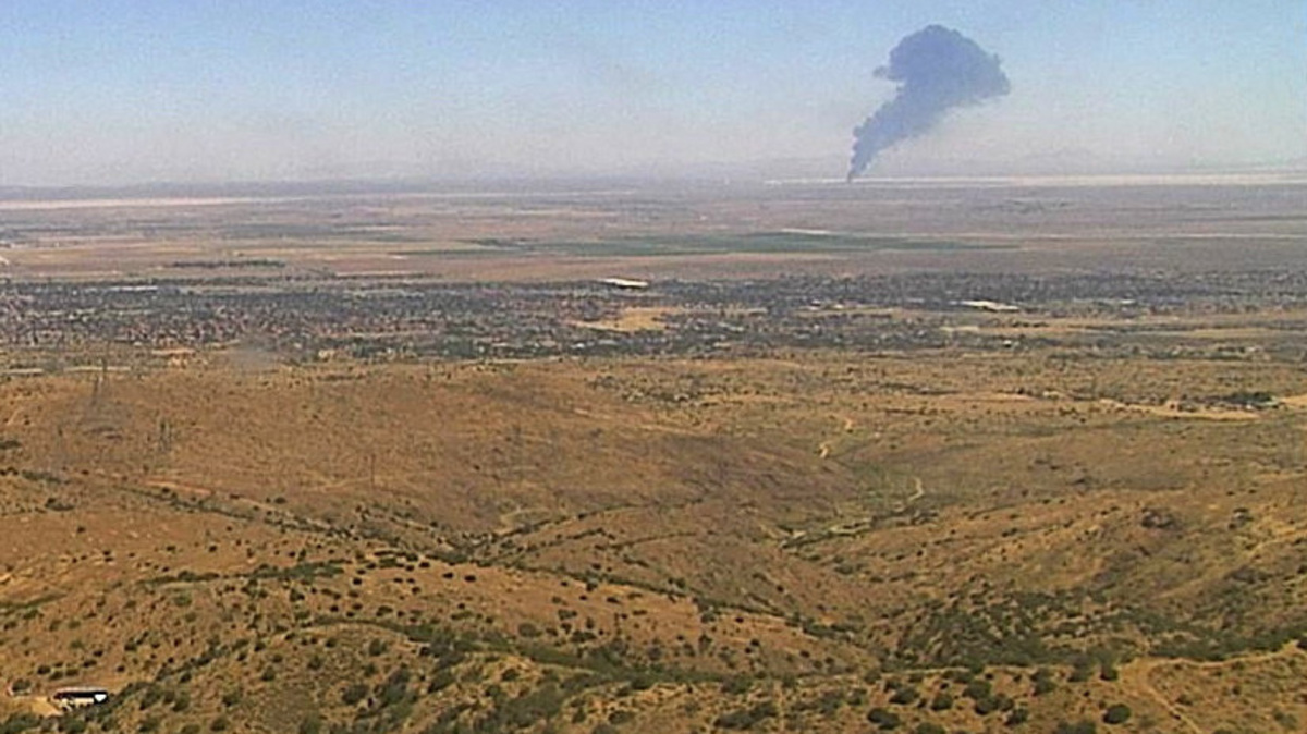 Smoke rises from Edwards Air Force Base after the crash of a U.S. Air Force B-52 bomber aircraft in Edwards, California, U.S., June 15, 2026, in a still image from an ALERTCalifornia fire surveillance camera. ALERTCalifornia/Handout via REUTERS