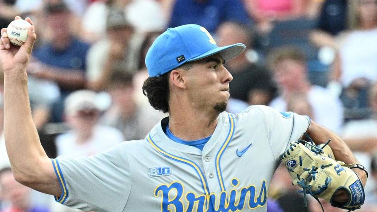  Jun 16, 2025; Omaha, Neb, USA; UCLA Bruins starting pitcher Landon Stump (14) throws against the LSU Tigers during the first inning at Charles Schwab Field. Mandatory Credit: Steven Branscombe-Imagn Images | Steven Branscombe-Imagn Images 