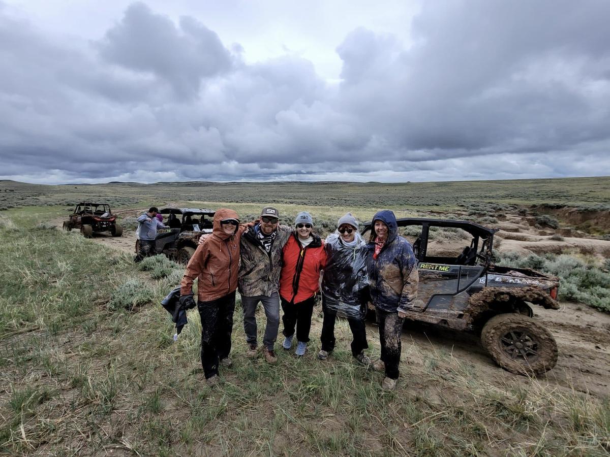  Muddy, but smiling. Our UTV ride was one of the most fun things I’ve done…ever. Photo credit: Cody Yellowstone 