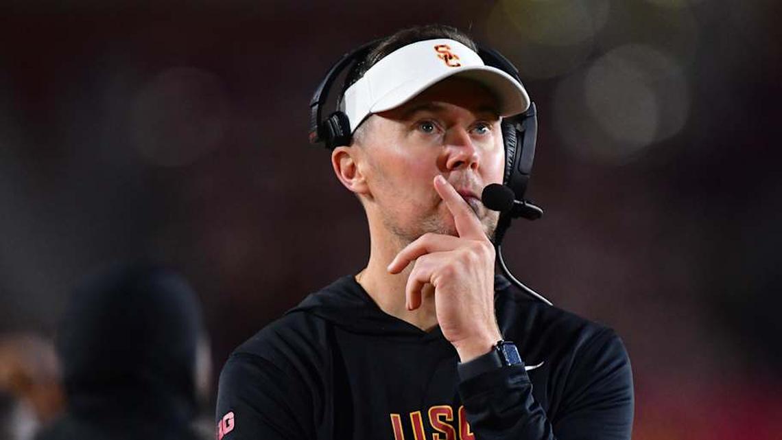  Nov 7, 2025; Los Angeles, California, USA; Southern California Trojans head coach Lincoln Riley watches game action against the Northwestern Wildcats during the second half at the Los Angeles Memorial Coliseum. Mandatory Credit: Gary A. Vasquez-Imagn Images | Gary A. Vasquez-Imagn Images 